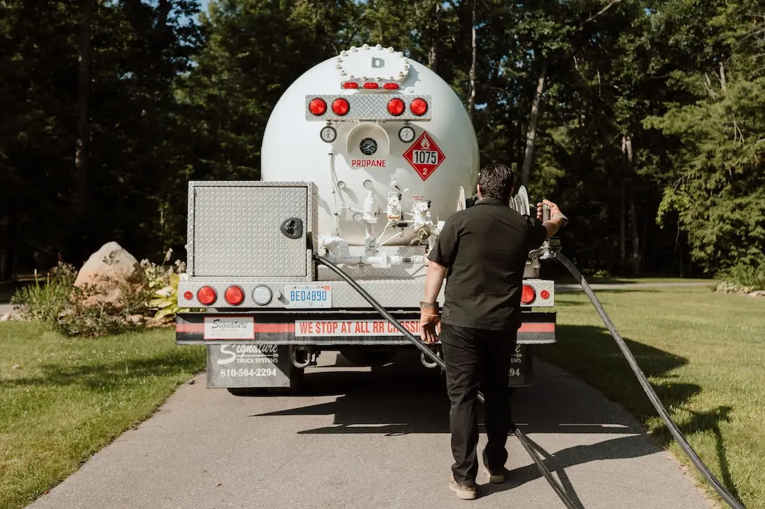 A propane tank monitor from Alpine Propane sitting atop one of their propane tanks.
