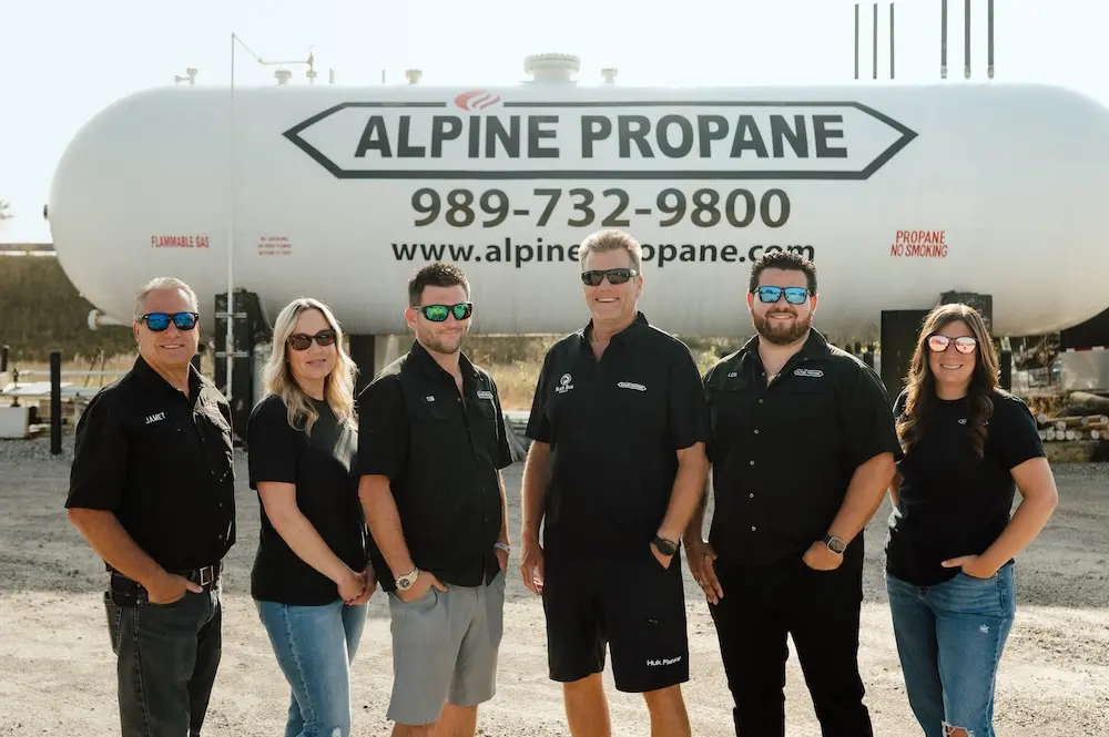 A propane tank monitor from Alpine Propane sitting atop one of their propane tanks.